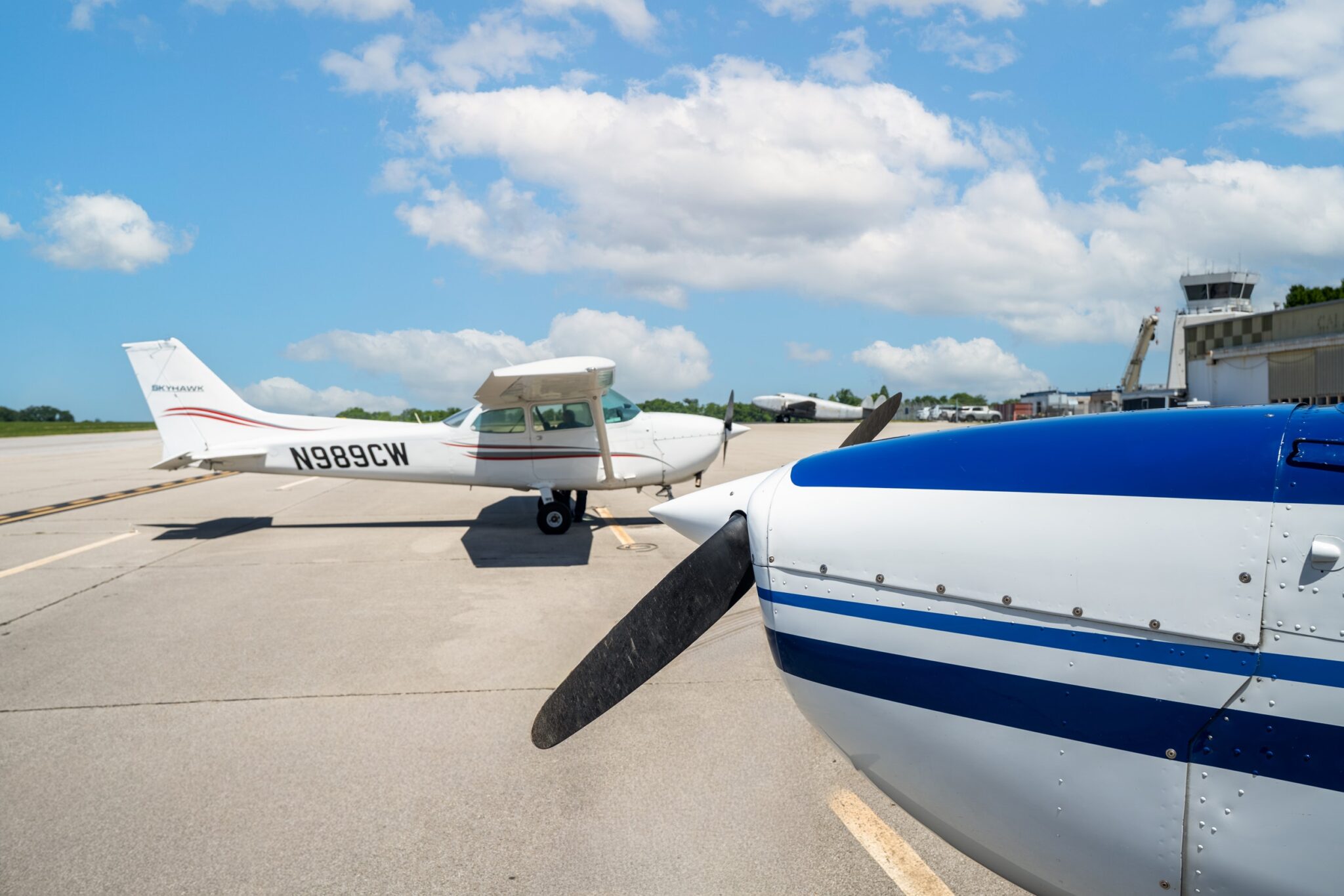 Cessna N989CW on the ramp at Bowman Field with the tower in the distance