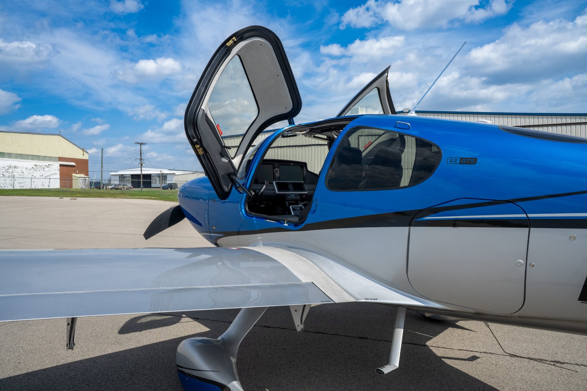 Cirrus aircraft with canopy open on the ramp, photographed by Shaun Wilson Designs