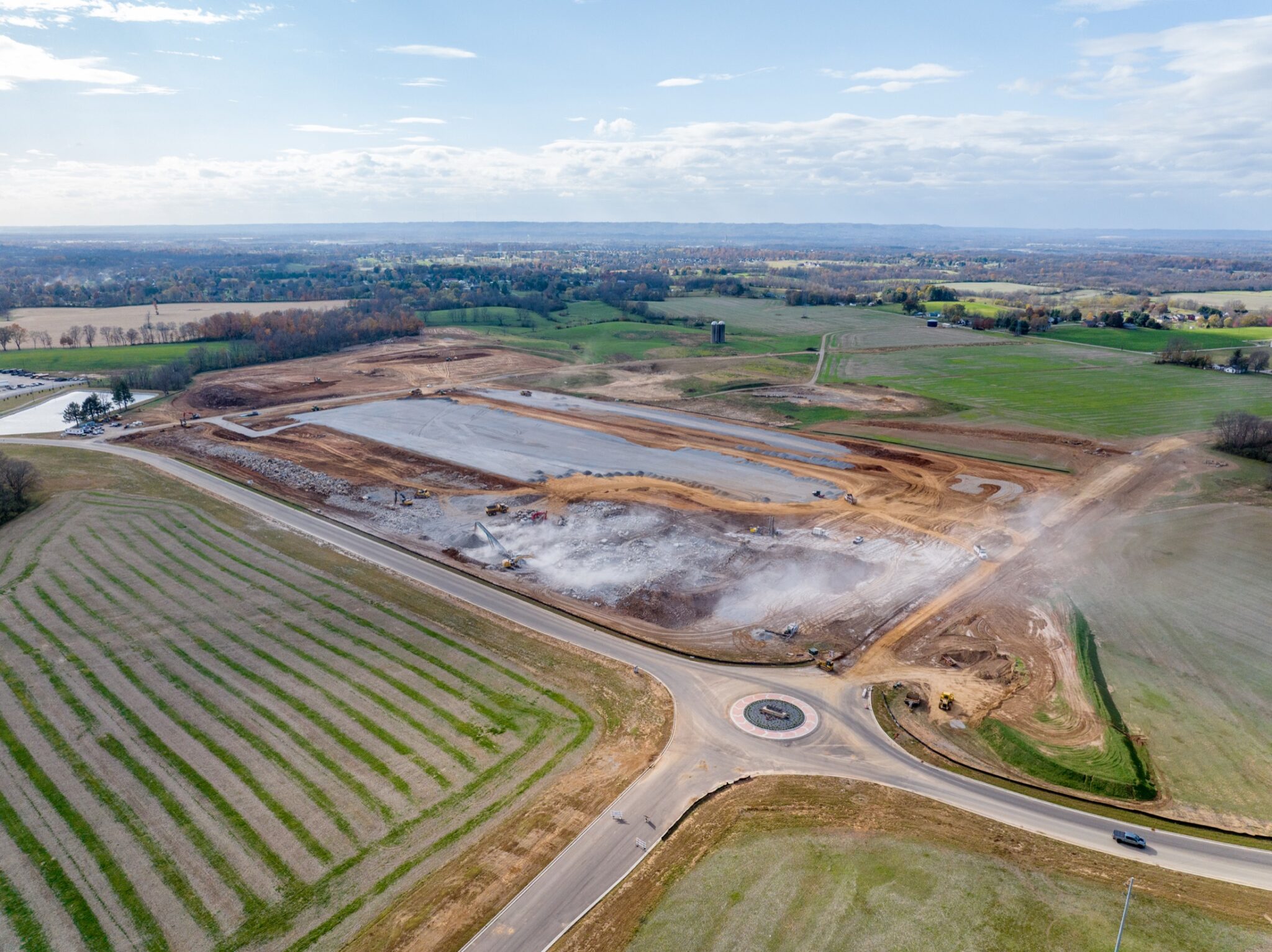 Aerial construction progress photo of an active commercial construction site