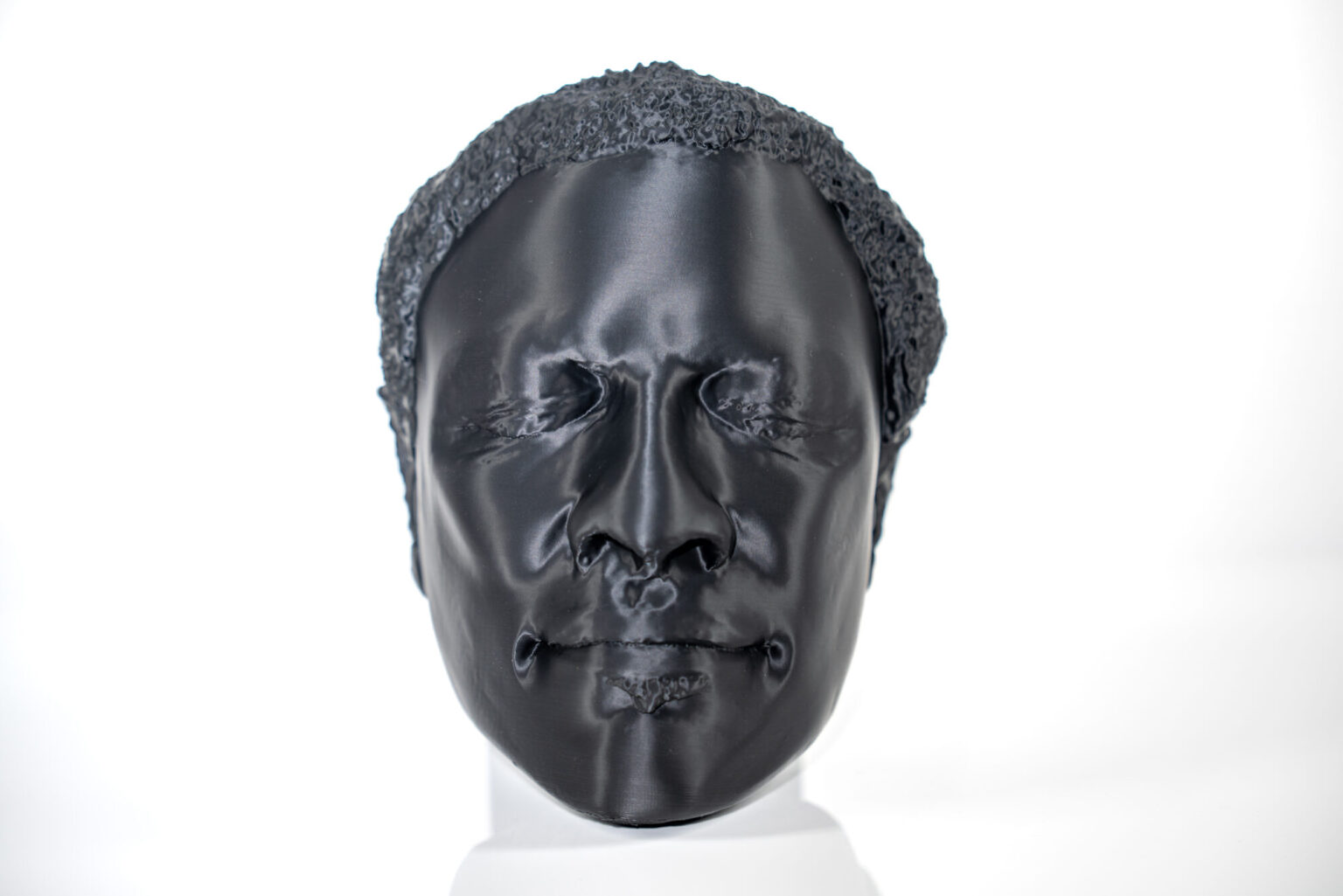 Life-size head and 14-inch sculpture prototype, project view 1