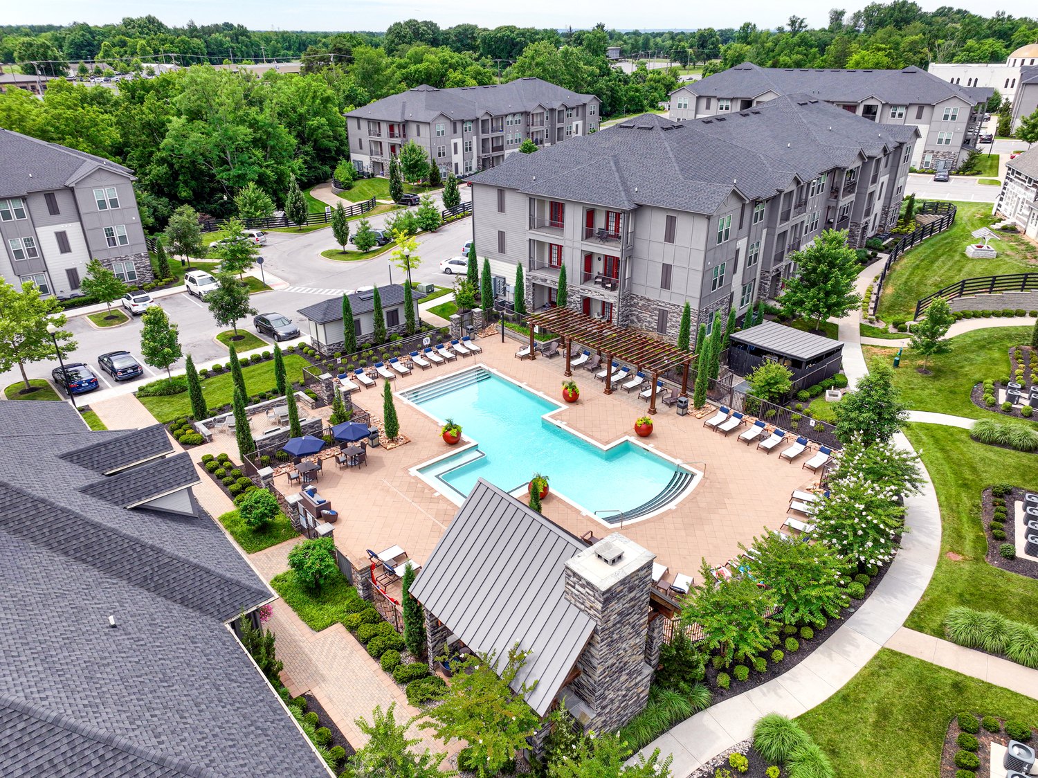 Aerial photograph of an apartment community and pool shot by Shaun Wilson in Louisville