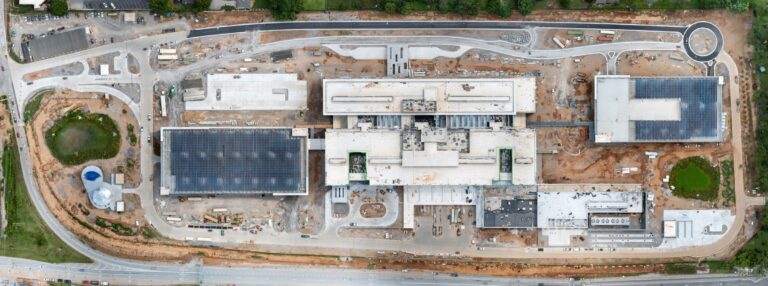 Drone orthomosaic map of the Louisville VA Medical Center construction site, July 2026 - roads, landscaping, and finished roofs