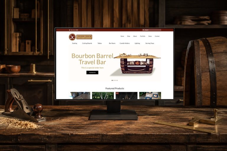 Bourbon Barrel Artisan website displayed in a refined cooperage and furniture workshop.