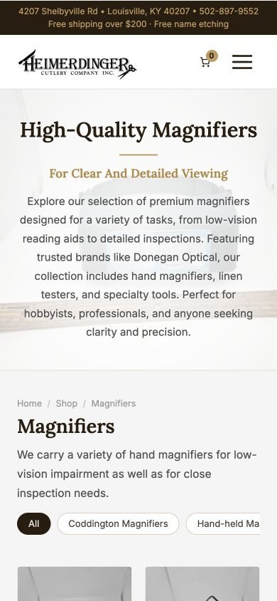 The Magnifiers category on the Heimerdinger Cutlery website on a 390-pixel phone.