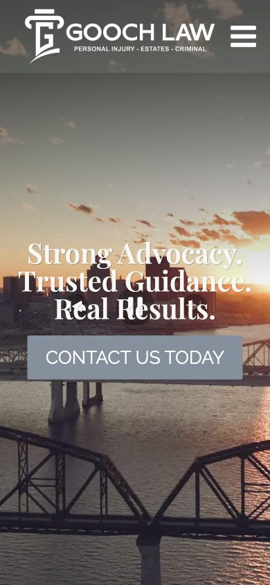 Exact capture of the Justin Gooch Law homepage on a 390-pixel phone.