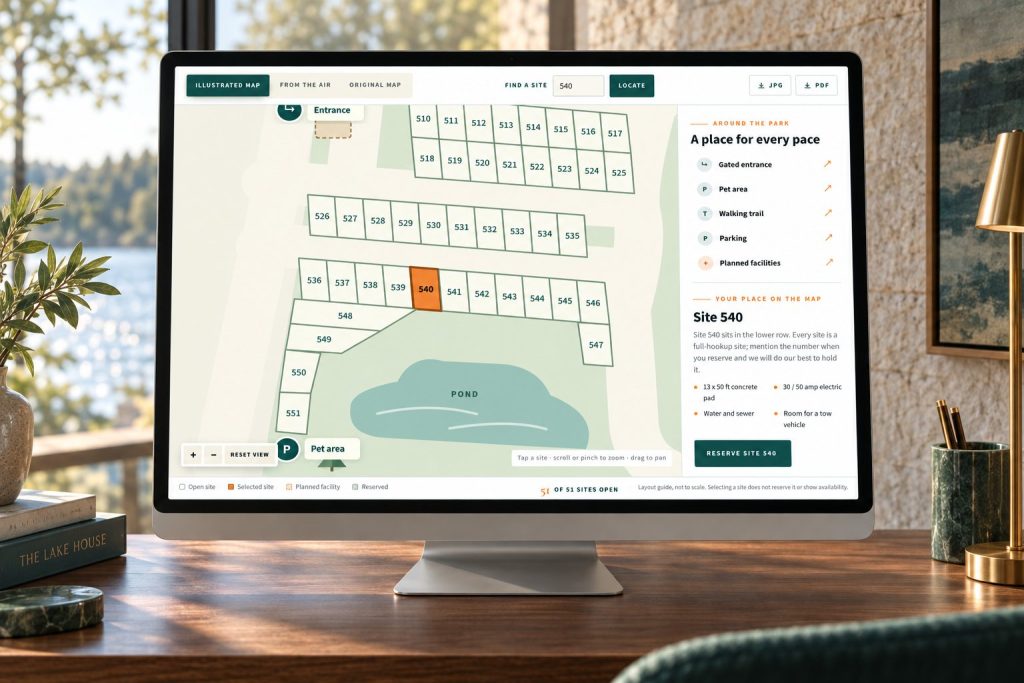 Lakeside Oasis RV Park interactive map with site 540 selected, on a desktop in a lake-house studio