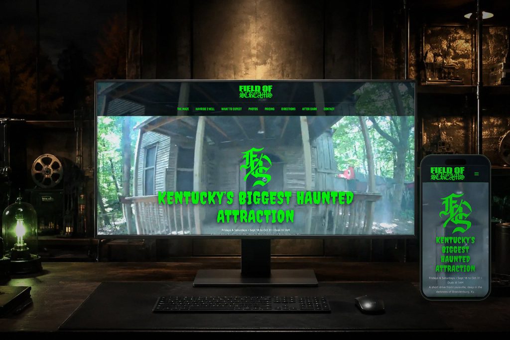 Field of Screams Kentucky website on a desktop monitor and a phone in a dark screening room, by Shaun Wilson Designs
