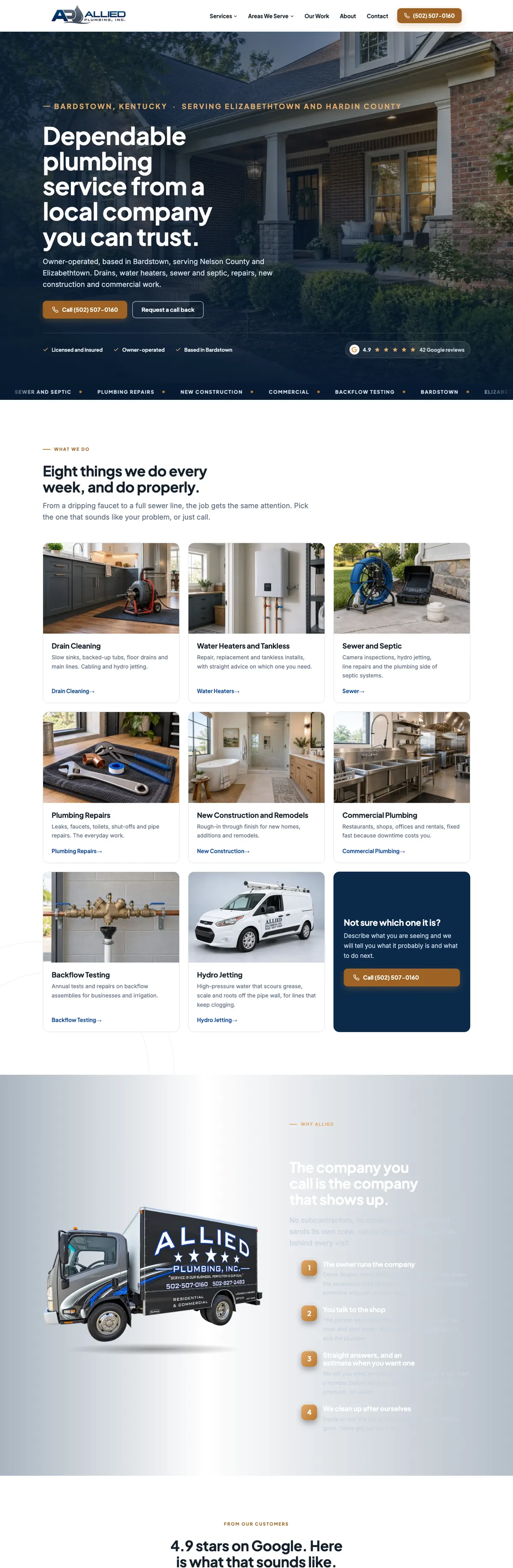 The Allied Plumbing website on a desk monitor
