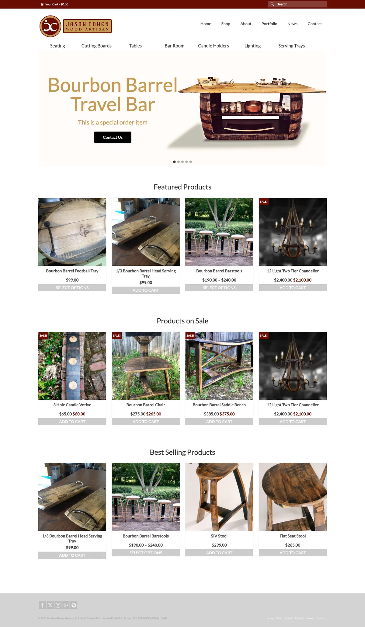 The Bourbon Barrel Artisan website on a desk monitor