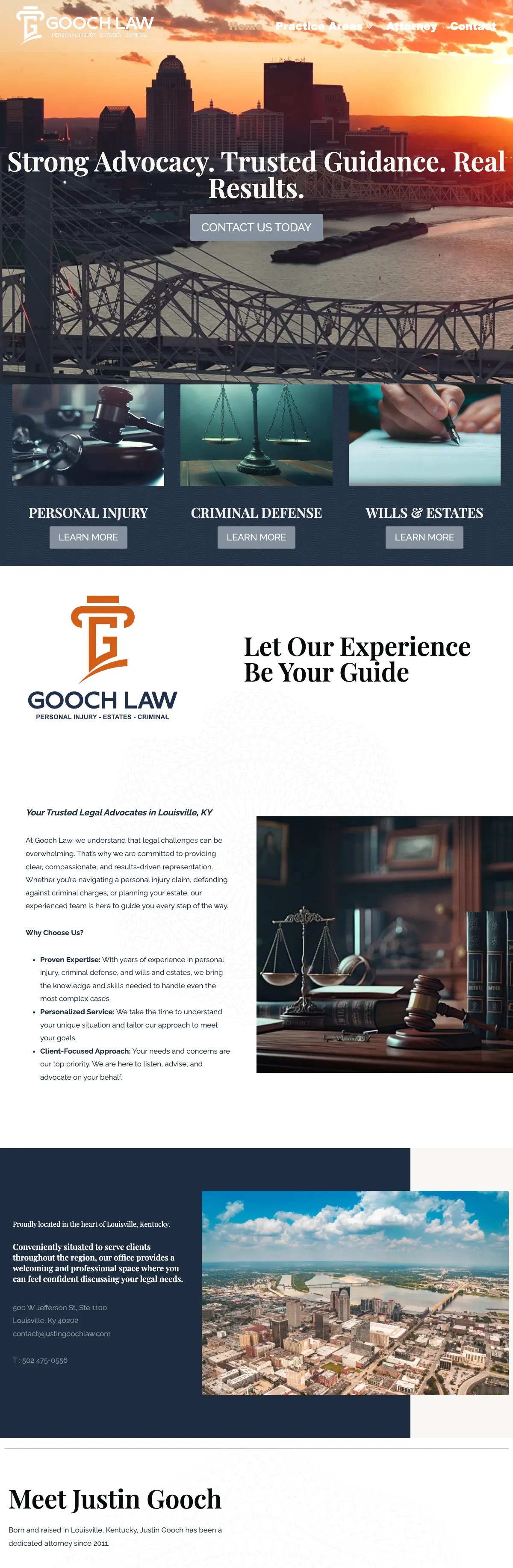 The Justin Gooch Law website on a desk monitor